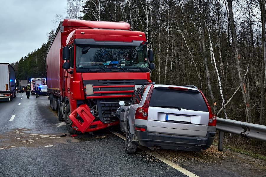 accident with vehicle and truck in North Dakota